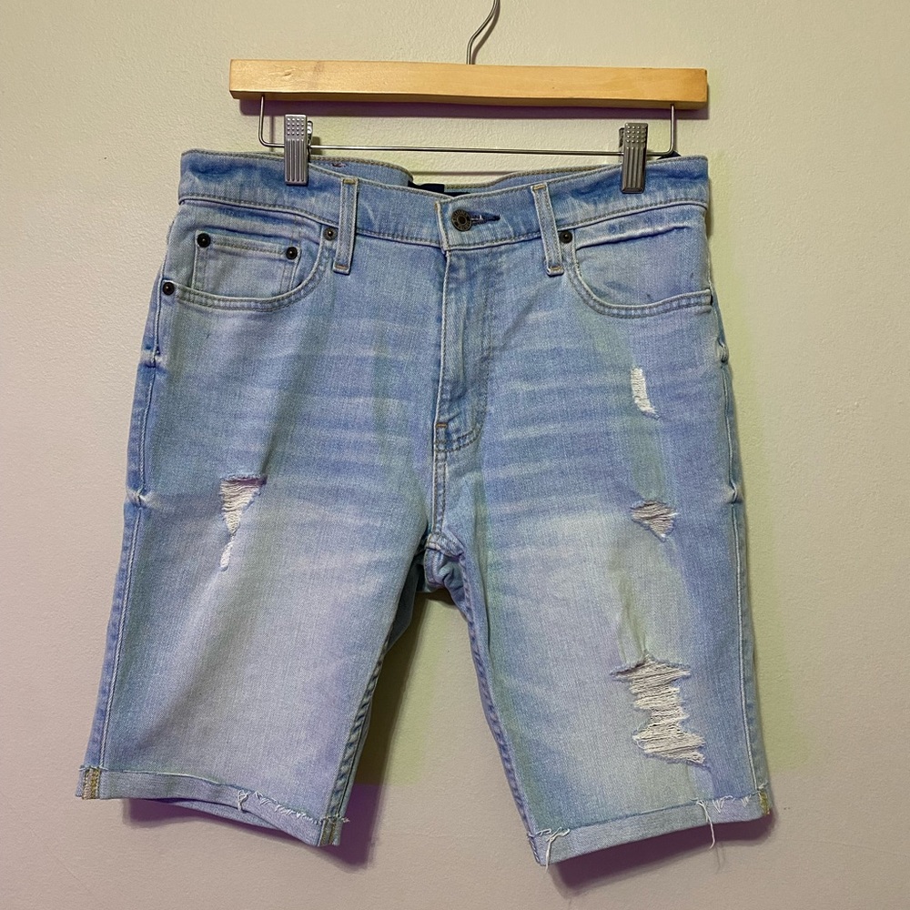 Hollister ripped jean shorts. New w/tags. Size 32